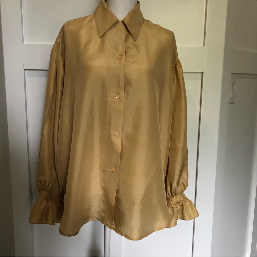 Silk long sleeve button front blouse.